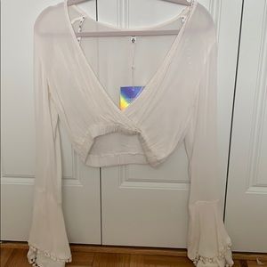 NWT bell sleeve with pom poms top